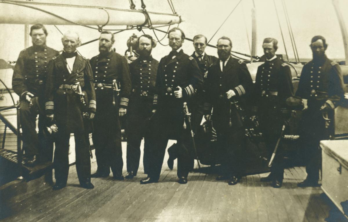 Rear Admiral John Dahlgren standing with his staff on board the sloop-of-war Pawnee off the Georgia coast in 1865