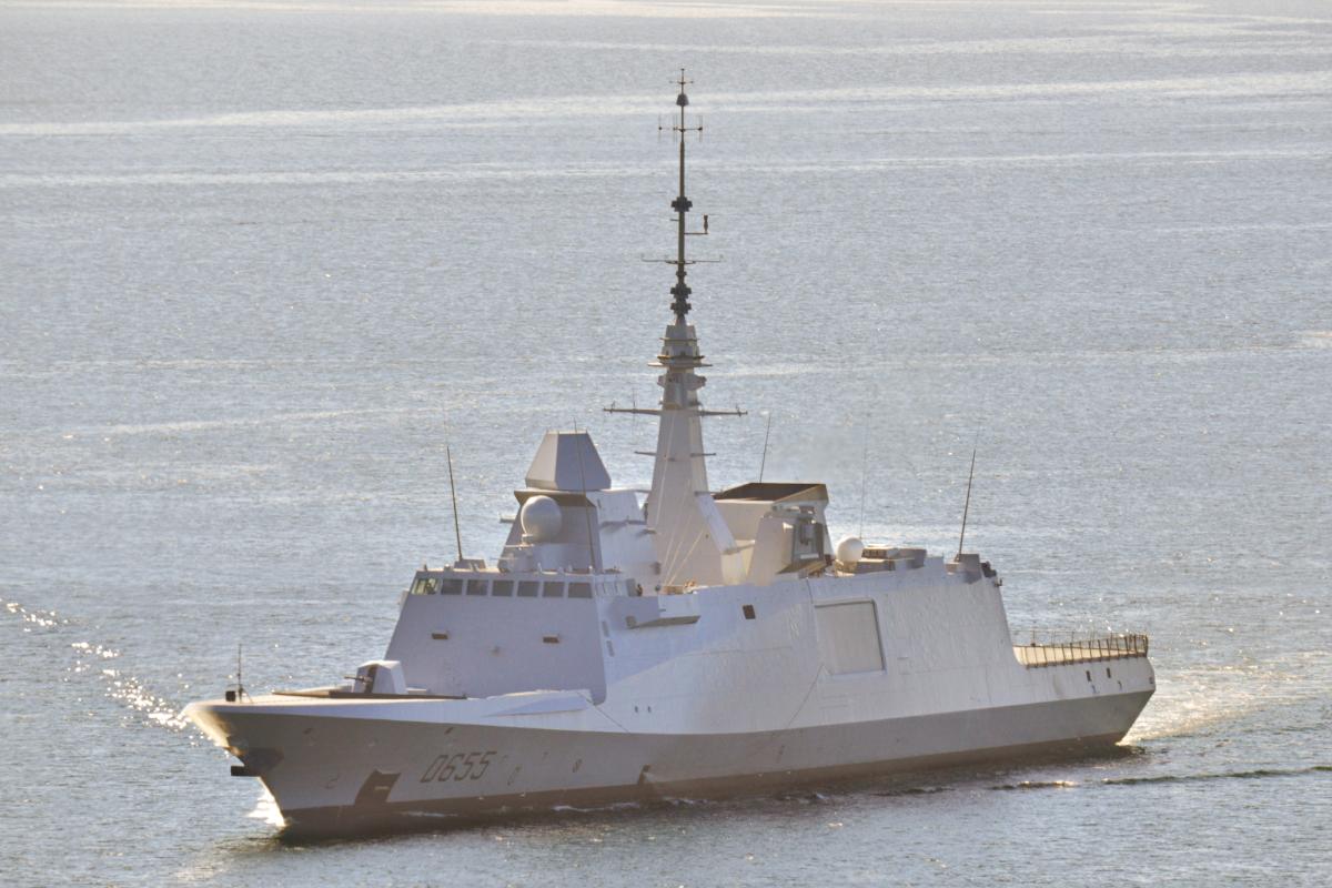Aerial port bow view of the French frigate Bretagne underway at sea