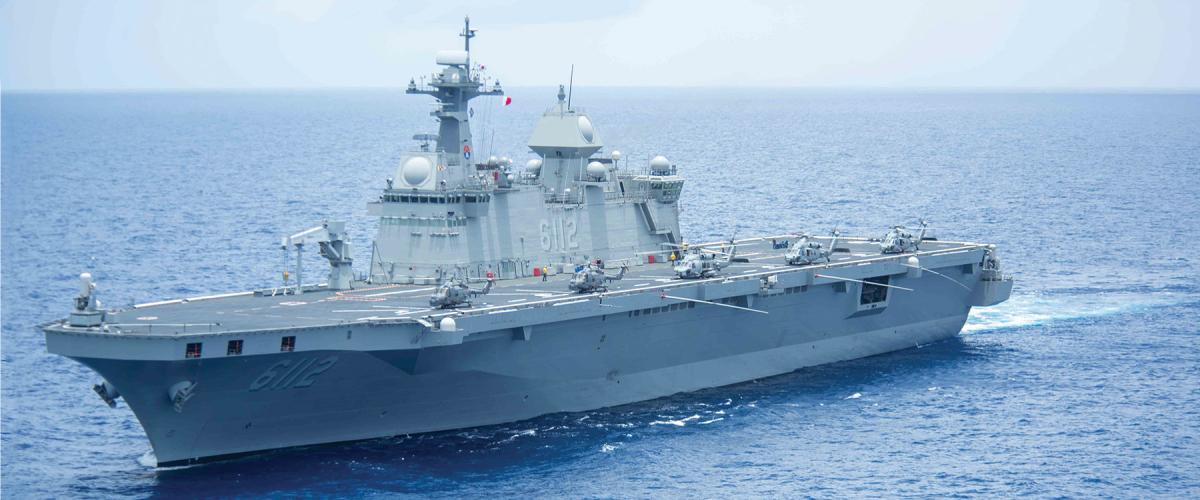 The Marado is pictured here with two Super Lynx and three Seahawk helicopters on the flight deck.