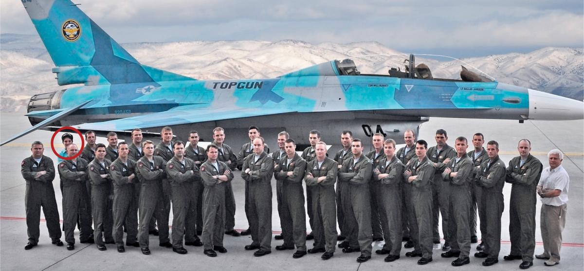 TOPGUN aviators posing in front of an F-16N fighter