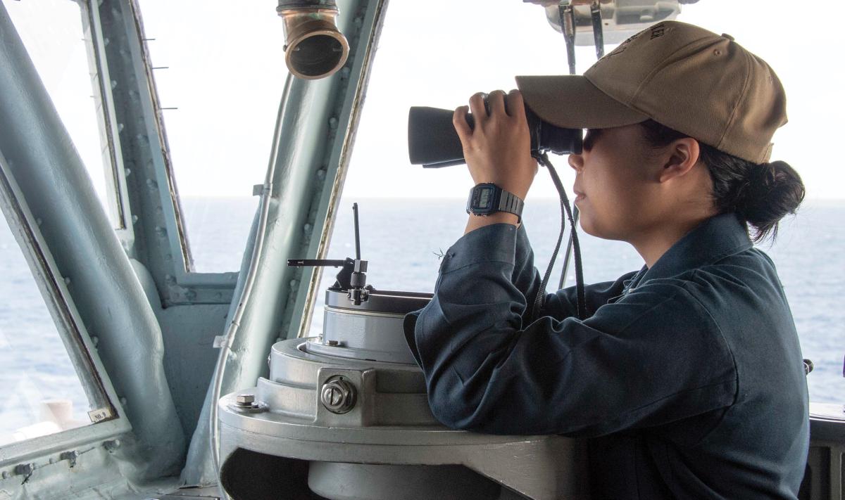 New ensigns should report to their first ships as fully qualified surface warfare officers. Aviation training can  provide a guide.