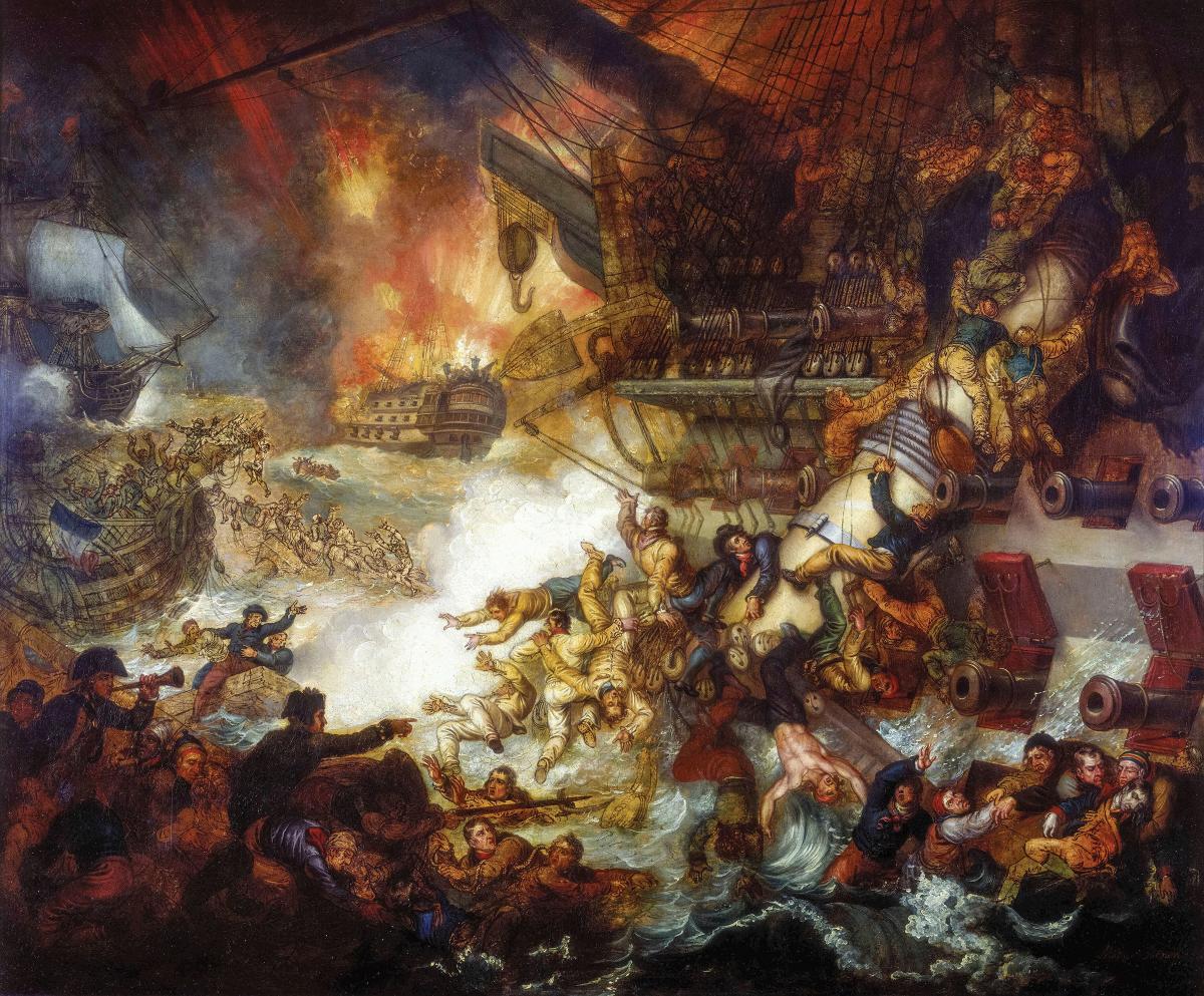 1 August 1798: The French 74-gunner La Spartiate, her mainmast split, sends sailors in the rigging crashing over the side, joining their comrades flailing in the briny. In the left-center background,  the chaotic scene is illuminated by the explosion of the French flagship l’Orient. Nelson’s decisive victory at the Battle of the Nile led to the disintegration of Napoleon’s army in Egypt. But victory came only on the heels of a confused and uncertain sea chase.