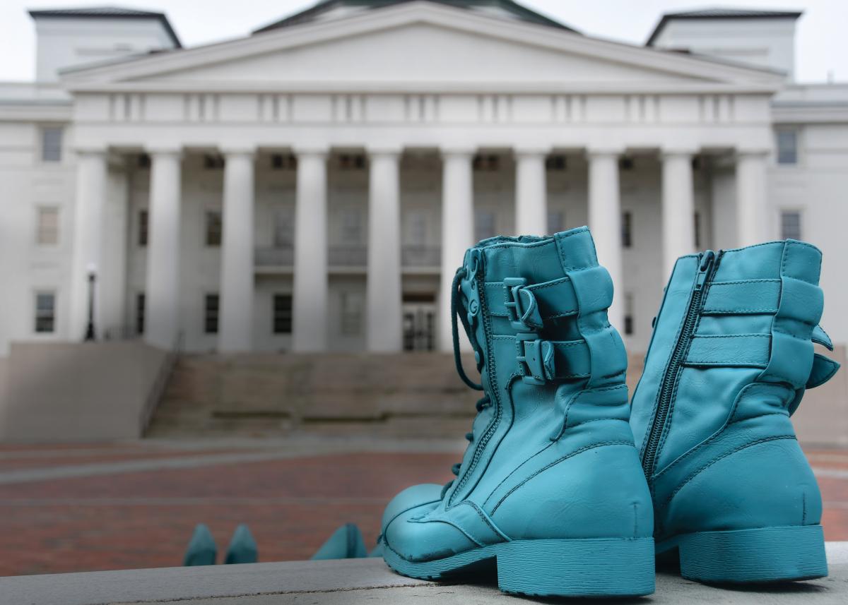 Teal shoes by the flag pole at Naval Medical Center Portsmouth