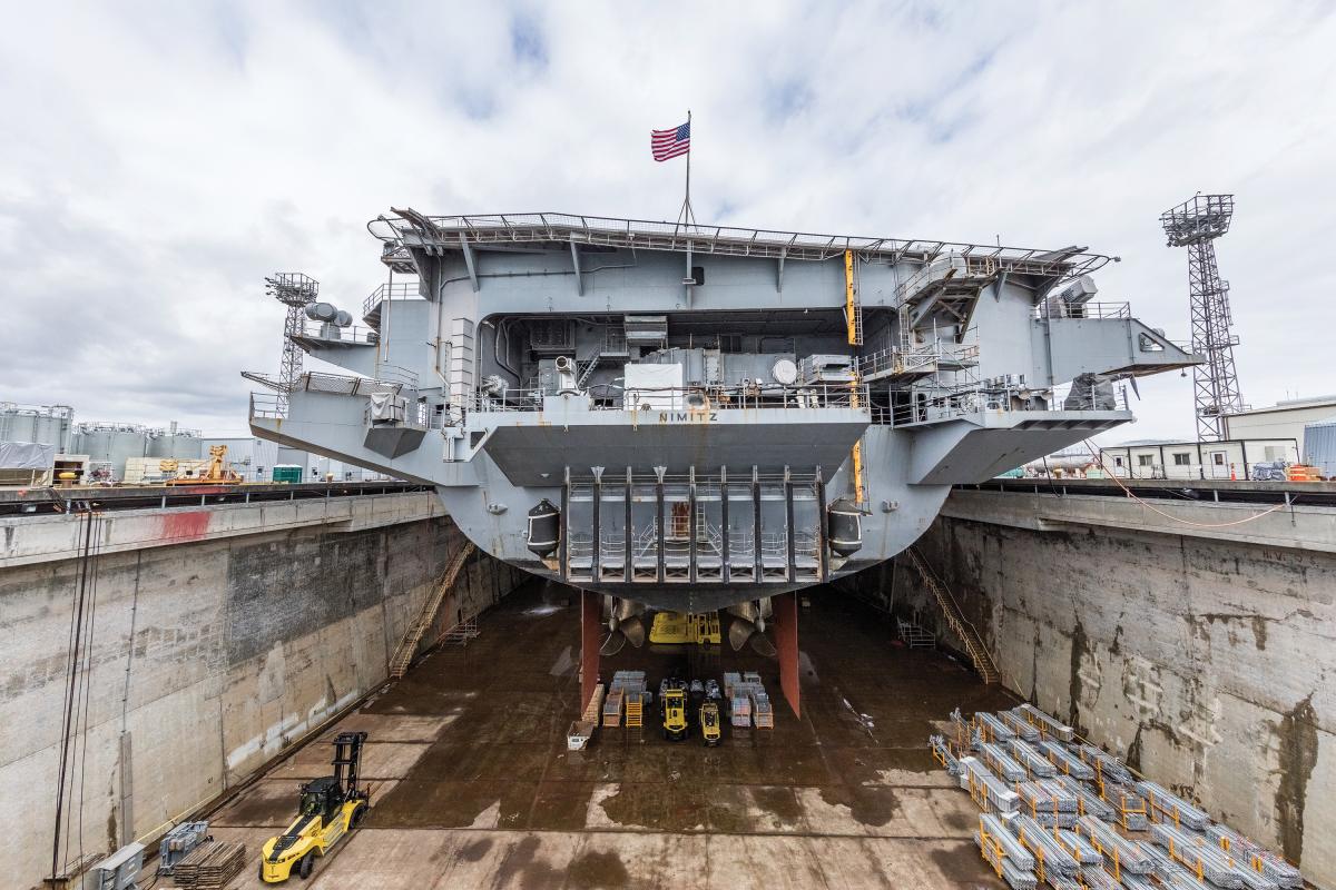  The aircraft carrier USS Nimitz (CVN 68) is seen in Dry Dock 6 after dewatering at Puget Sound Naval Shipyard & Intermediate Maintenance Facility in Bremerton, Wash., March 5, 2018