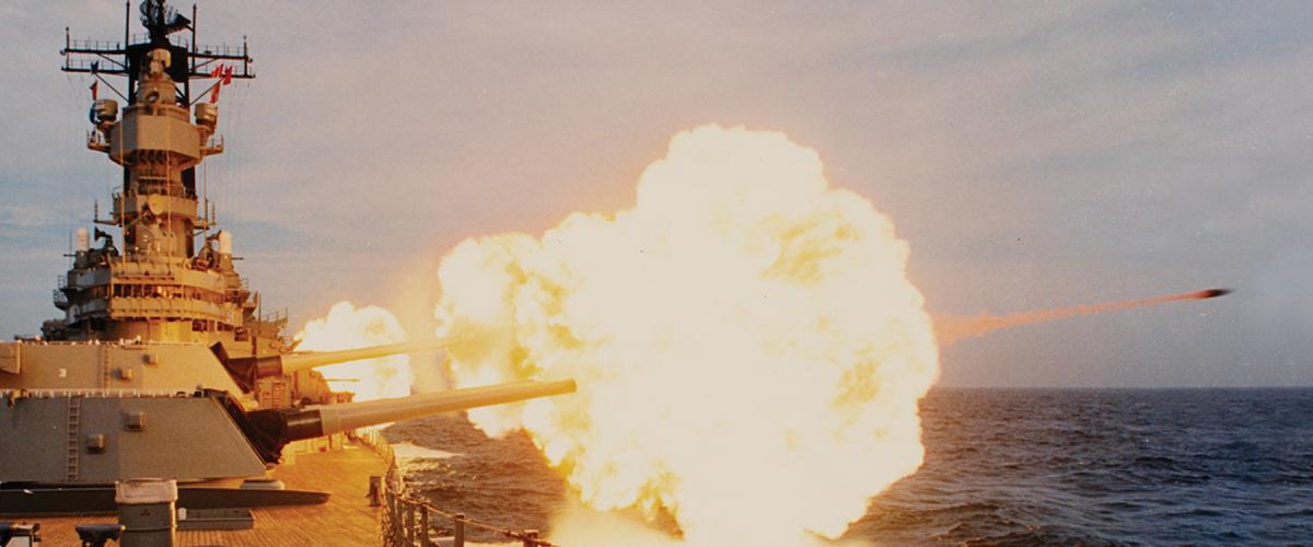 The USS Missouri (BB-63) fires her Mark 7 16-inch/50-caliber gun