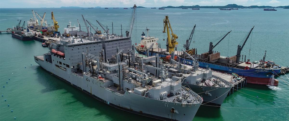 The USNS dry cargo ships Richard E. Byrd (T-AKE-4) and Washington Chambers (T-AKE-11) at a Unithai facility in Thailand. Unithai holds one of the 46 master ship repair agreements issued in the western Pacific that allow private shipyards to perform work on U.S. Military Sealift Command ships—but not commissioned U.S. warships.