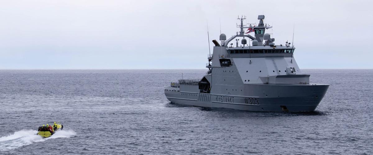 A boat from the Norwegian Coast Guard vessel Svalbard delivers crew members from the USCGC Healy (WAGB-20) as part of a crew exchange. The Norwegian Coast Guard—which has no shortage of afloat officers—dual crews its ships following a predictable schedule. The U.S. Coast Guard should take note.