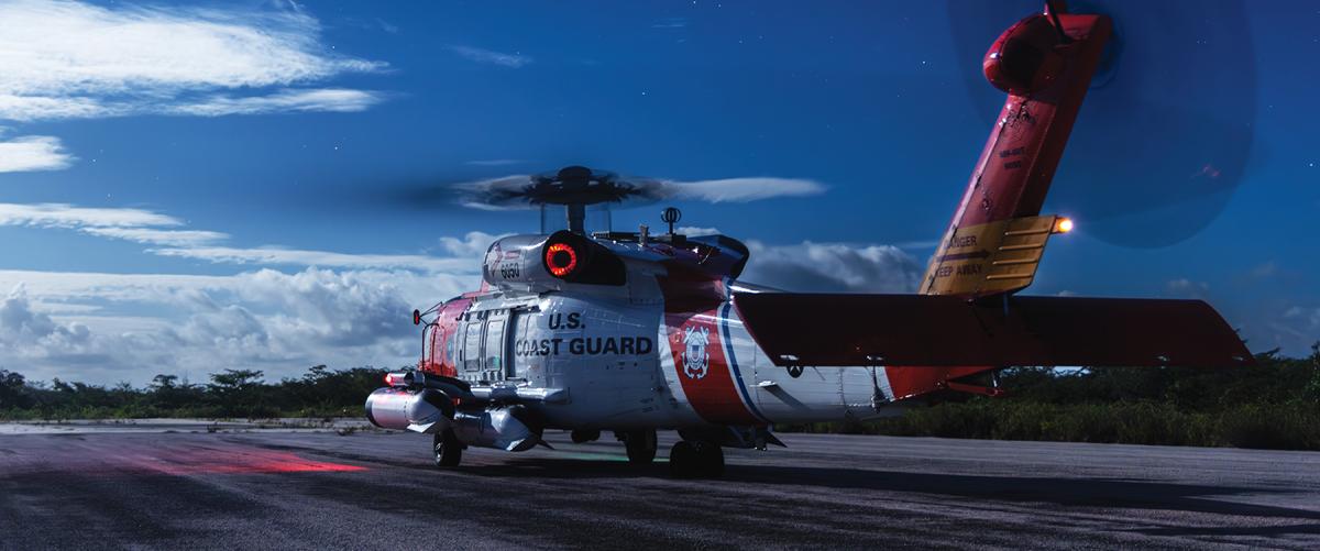 An MH-60T Jayhawk on the runway in Great Inagua, Bahamas. The Coast Guard plans to grow its fleet of MH-60Ts from 48 to 127, but the first phase of that growth is expected to include just 36 aircraft.