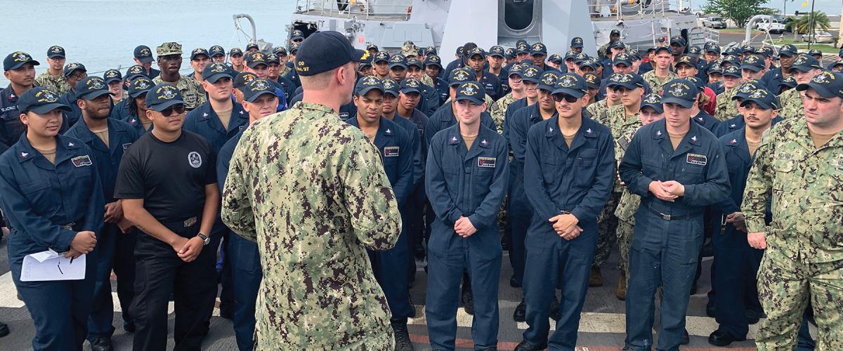 The commanding officer of the USS Halsey (DDG-97) speaks to the crew during an all-hands call. A captain must impart a fundamental sense of purpose: to prepare for missions at sea, the most important of which is to defeat other navies.