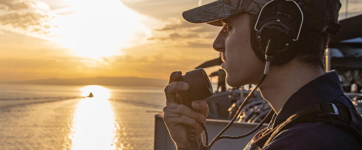 A sailor stands watch on the USS George H. W. Bush (CVN-77) in November 2022.  Ask any sailor who has been underway, and it will not be hard to find something all deployed ships are short of: Sleep.