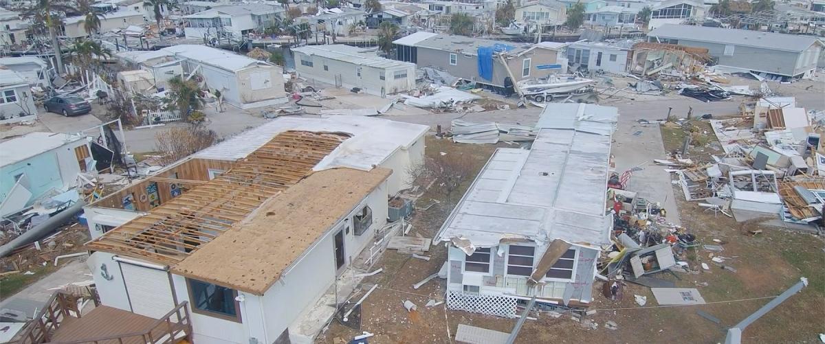 A Coast Guard drone examines damage after Hurricane Ian in October 2022. Already used in land-based search-and-rescue missions, drones could be used to spot persons in the water and locate vessels in distress, debris fields, and/or pollution.