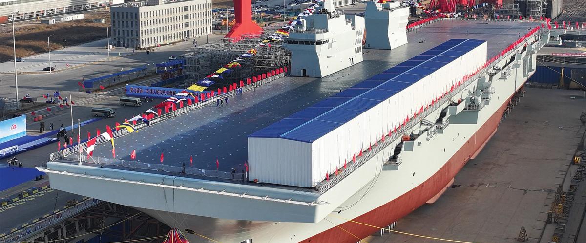 The Sichuan—the first Type 076 new-generation amphibious assault ship—was launched in Shanghai in December. It is the first such ship in any navy to be equipped with an electromagnetic catapult, which in this image is hidden by the long shed.