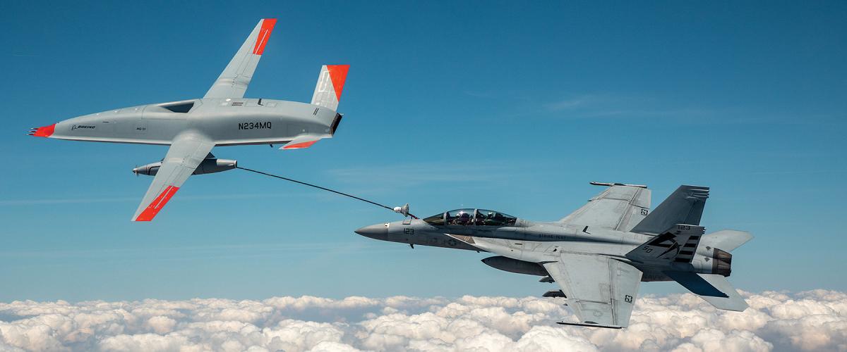 Super Hornet refuels with an MQ-25 Stingray