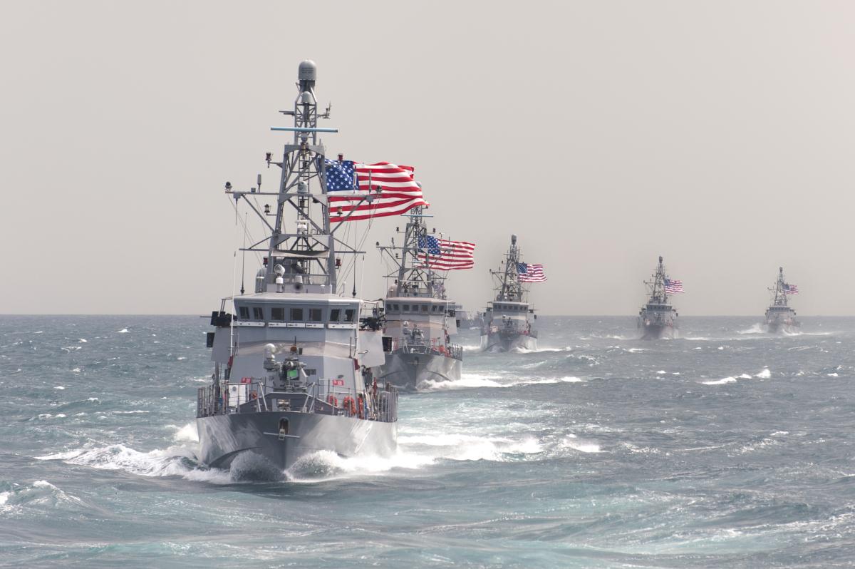 USS Hurricane (PC-3) leading other coastal patrol ships in formation.