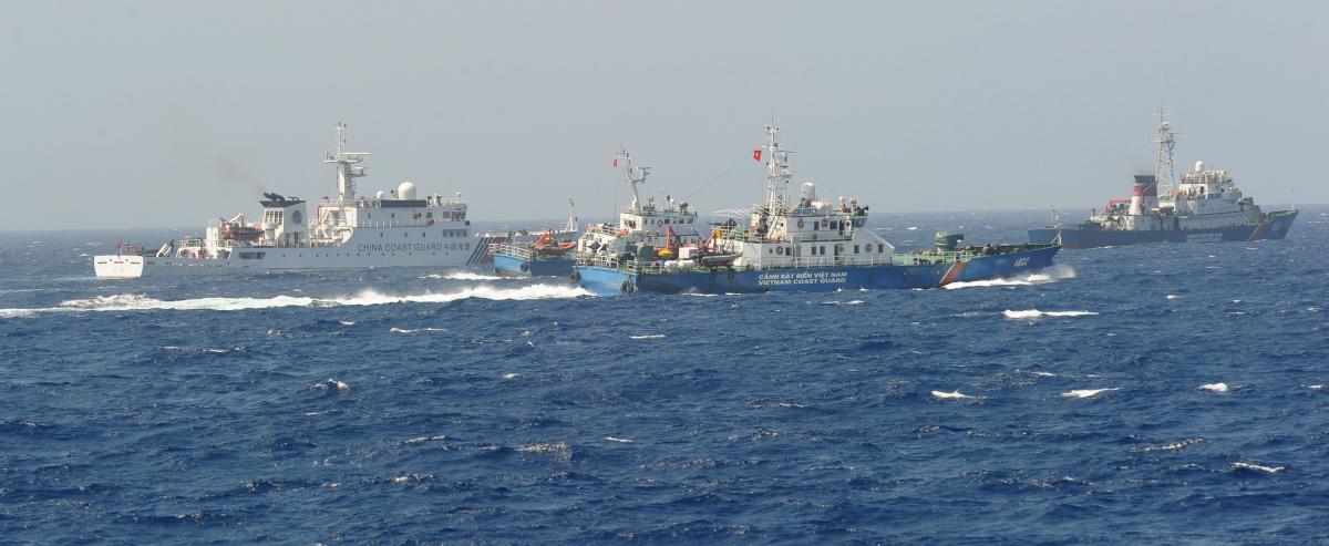 A Chinese and Vietnamese Coast Guard vessels clash near an oil drilling rig Beijing deployed in disputed waters