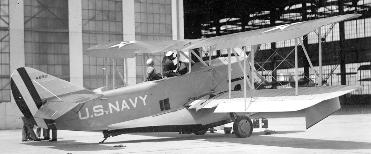 An OL-2 showing the aircraft’s two open cockpits; it could be flown with a control wheel in the forward cockpit or a control stick in the rear cockpit.