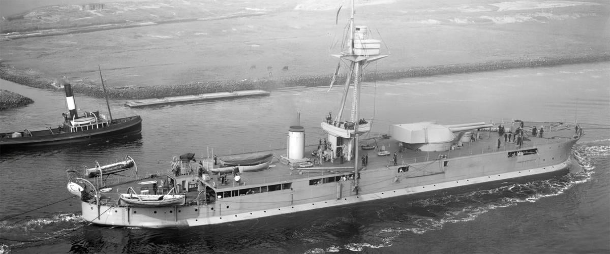 HMS Raglan leaving the Harland & Wolff shipyard where she was built. The U.S.-manufactured 14-inch guns of the Abercrombie class were originally intended for the Greek battlecruiser Salamis.