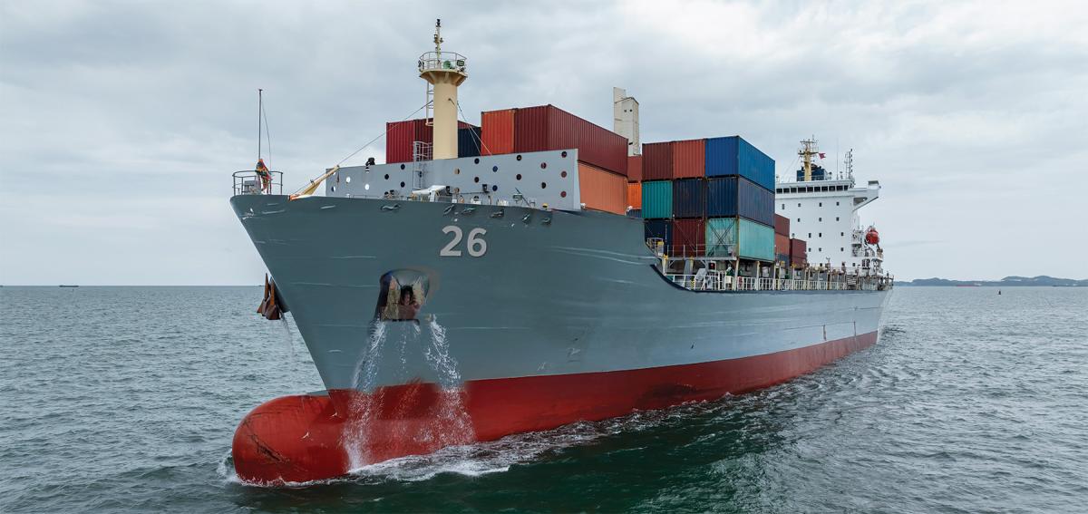 A concept showing a container ship as it might look after  conversion to a warship with containerized missiles and drones weapons, including the missile launcher shown amidship.