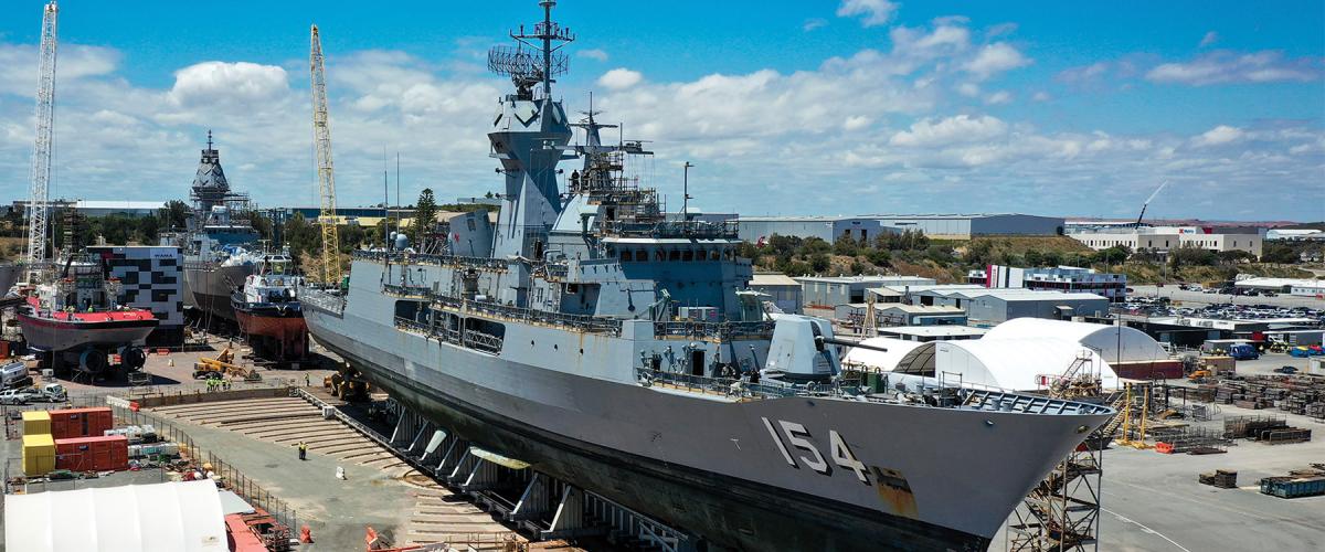 The Australian government has dedicated the largest portion of its Integrated Investment Program  to shipbuilding and ship repair. Here, HMAS Parramatta arrives at Henderson Shipyard in Western Australia to begin her Anzac Midlife Capability Assurance Program upgrades. 