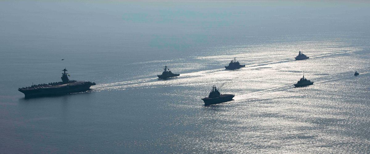 The USS Gerald R. Ford (CVN-78) and Normandy (CG-60) sail in formation with allied ships during Neptune Strike in July 2023. The 1980s Maritime Strategy allowed the Navy to prioritize how it operated, the kinds of ships and aircraft it built, and how senior leaders advocated for resources. There are many lessons for today’s Sea Services. 