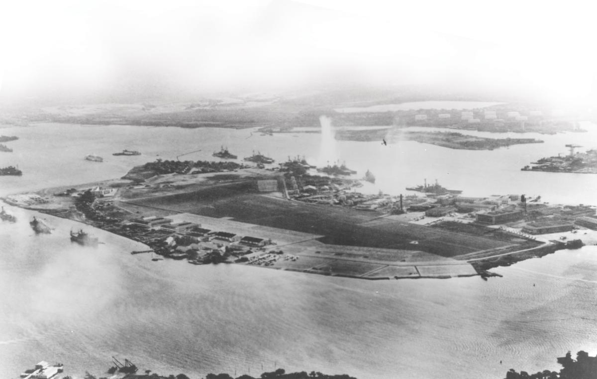 Aerial view of Ford Island, Pearl Harbor, under attack on 7 December 1941