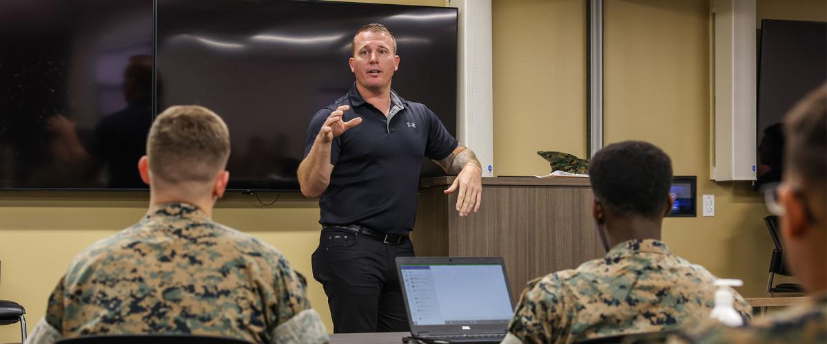 Medal of Honor recipient Dakota Meyer speaks with Corporals Course students from Marine Corps Installations West Communications and Information Systems Division, Marine Corps Base Camp Pendleton, at Camp Pendleton.  