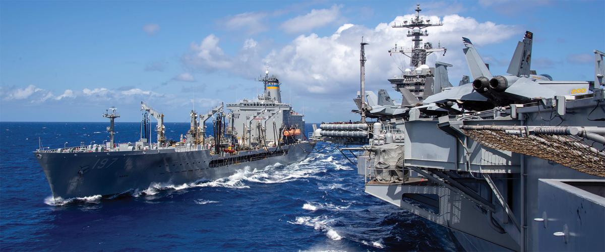 The USS Carl Vinson (CVN-70) conducts a fueling at sea with the USNS Pecos (T-AO-197)—an underway replenishment oiler with a primarily civilian crew—during Rim of the Pacific 2024. Civilian mariners provide critical logistical support to the Navy, but their numbers are dwindling.
