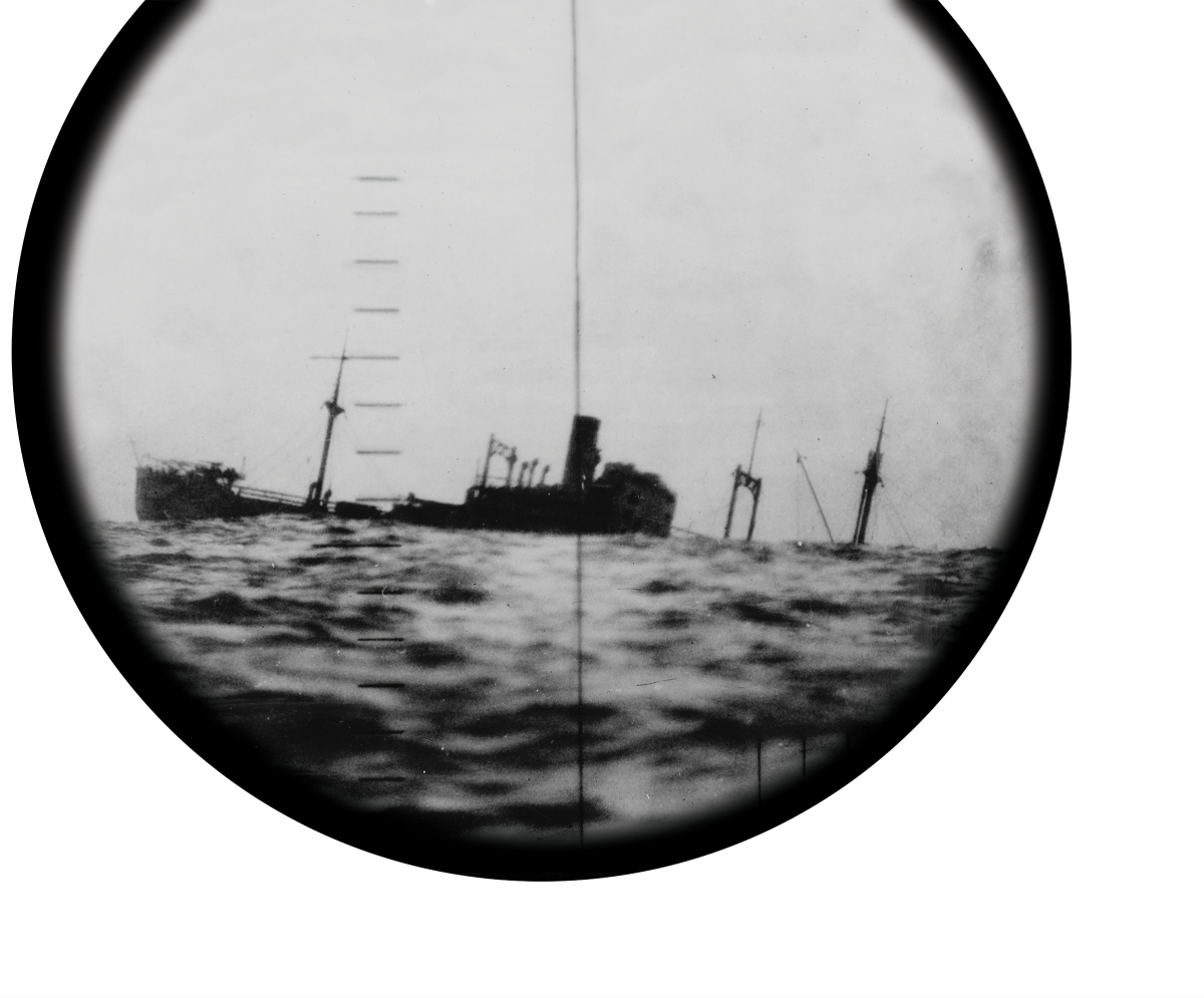 A sinking Japanese ship seen through the periscope of a U.S. submarine.