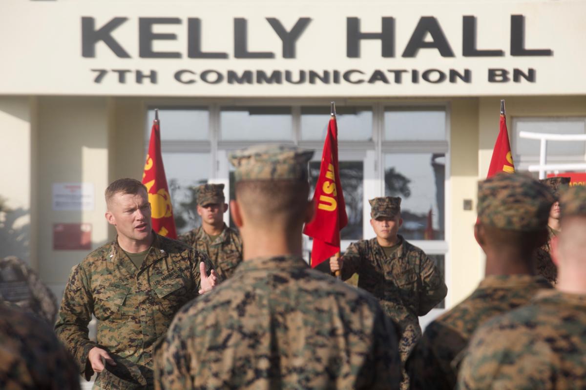 U.S. Marine Lt. Col. Michael Hlad addresses the Marines of 7th Communication Battalion following a 6.1 mile hike commemorating 7th Comm. Bn.’s 61st anniversary aboard Camp Hansen, Okinawa, Japan, Oct. 25, 2018.