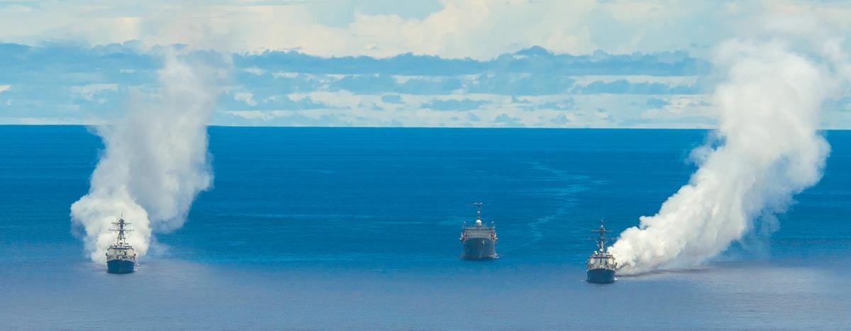 The USS Mustin (DDG-89), Wayne E. Meyer (DDG-108), and Frank Cable (AS-40) 