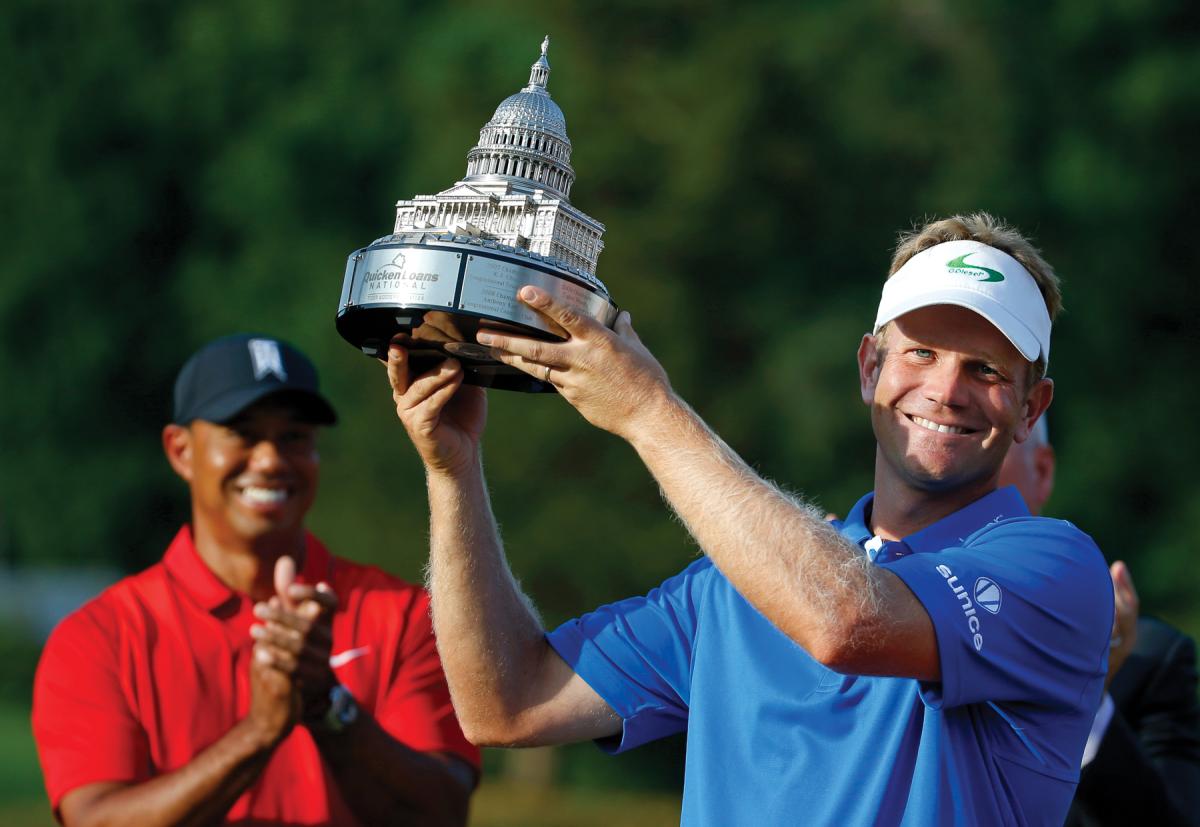 Billy Hurley III raises the Quicken Loans National PGA trophy