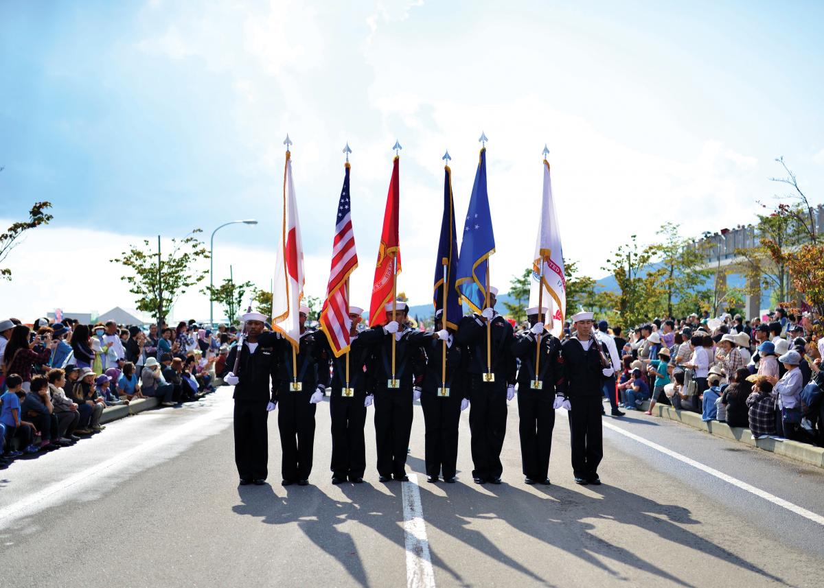 U.S. Navy Honor Guard from Misawa, Japan, marches in the 2015 Aomori Ten City Parade in Mutsu, Japan