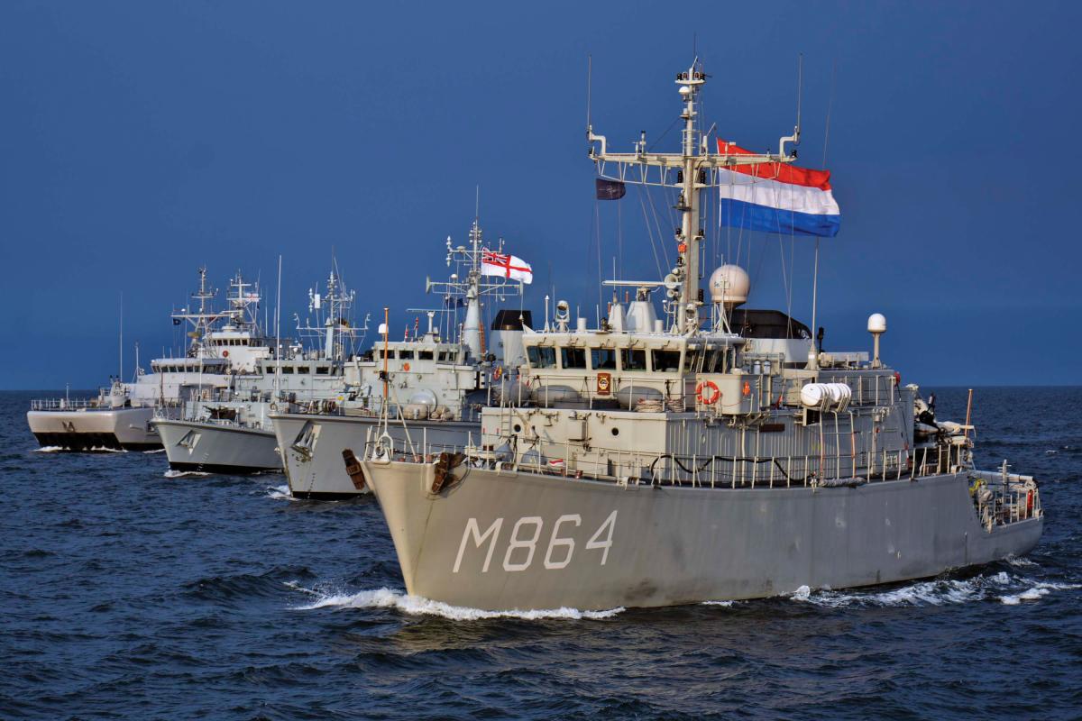 The Dutch minehunter HNLMS Willemstad (M-864) transits in formation during maneuvering exercises with Standing  NATO Mine Countermeasures Group 1 and Estonian Navy ships, all participating in international exercises with allied nations in the region.