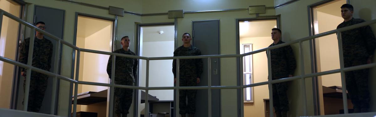 Brig Marines simulate being awardees during a Correctional Custody Unit demonstration Jan. 12 2018