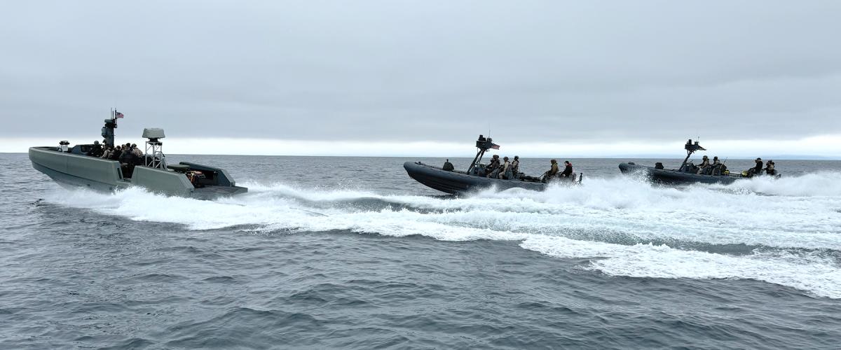 An Australian-designed Whiskey Bravo boat and two former Naval Special Warfare 11-meter rigid-hull inflatable boats that have been acquired by the 1st Light Armored Reconnaissance Battalion. The Whiskey Bravo is an experimental craft acquired by the Defense Innovation Unit and Marine Corps Warfighting Lab. It is being used to help refine requirements for what might eventually become an RFP and program of record. But, for now, it is one-of-a-kind.