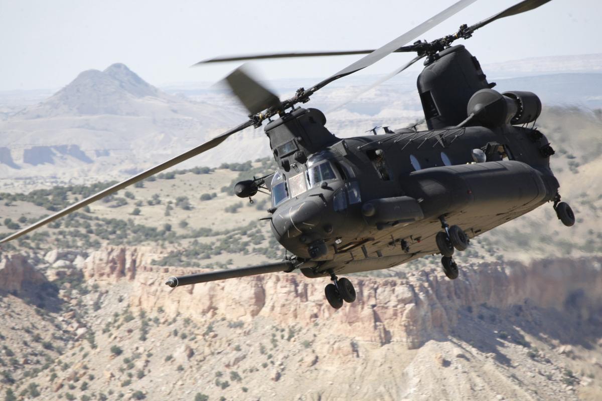 An Army MH-47 Chinook flies over Afghanistan.