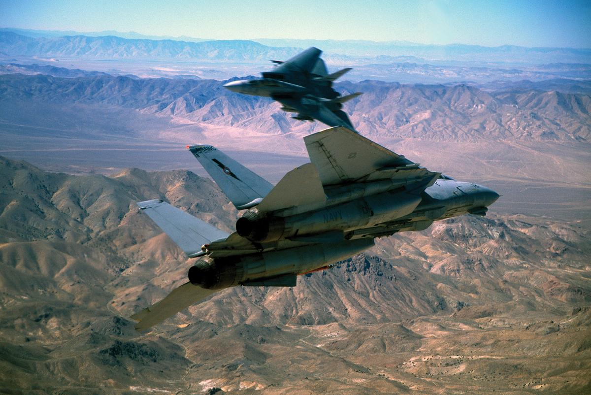 Two F-14 Tomcats go “beak to beak” in the skies near Fallon, Nevada