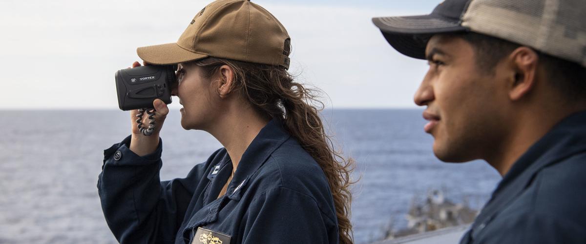 Sailors stand watch on the USS Dewey (DDG-105).