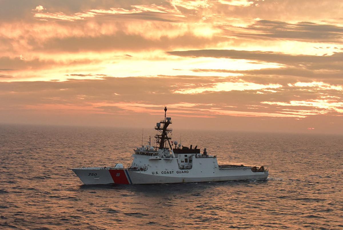 The USCGC Bertholf (WMSL-750) basks in a sunset glow in the Yellow Sea while deployed to the 7th Fleet area of responsibility in 2019.
