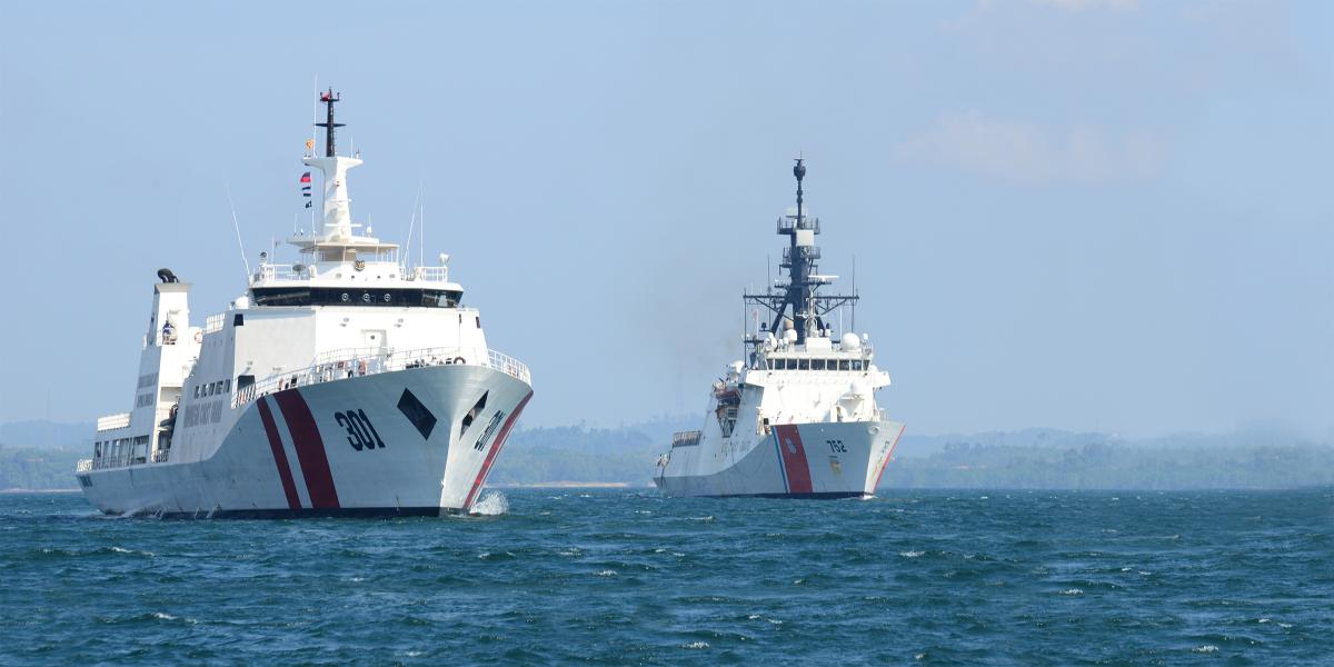 The USCGC Stratton (WMSL-752), shown here transiting the Singapore Strait alongside the Indonesian vessel KN Tan Jun Datu.