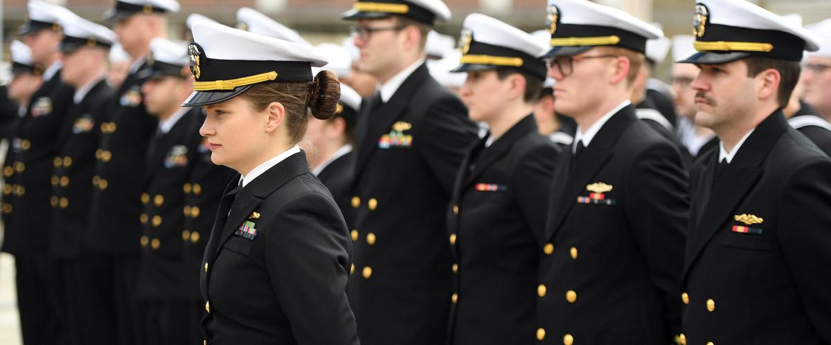 The crew of the USS Virginia (SSN-774) stands at parade rest. A shrinking submarine fleet has been able to lessen the impact of manning issues, but when submarine numbers begin to grow again, improving junior officer retention alone will not be enough.