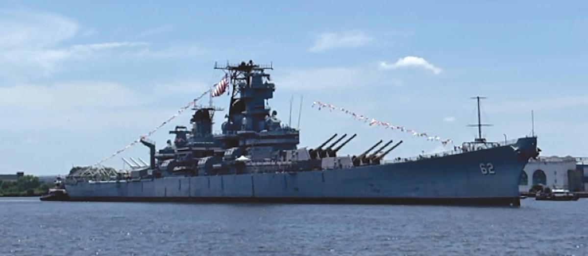 After three months of much-needed repairs and maintenance, the New Jersey approaches her home port of Camden.