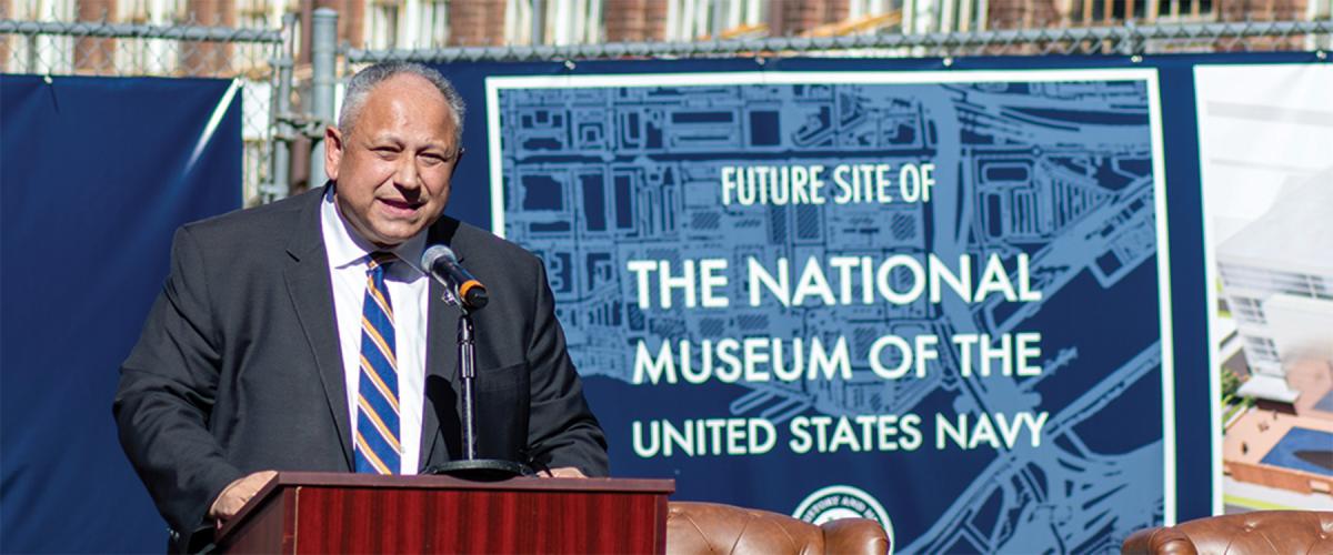 Secretary of the Navy Carlos Del Toro speaks to audience members during a ceremony for the new National Museum of the United States Navy in Washington, D.C.