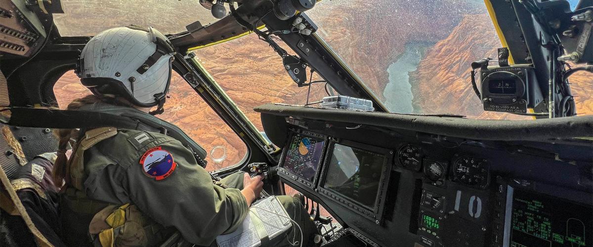 Lieutenant Claire Thatcher, an aviator from the Merlins of Helicopter Sea Combat Squadron 3, flies her MH-60S Seahawk/Knighthawk over the Grand Canyon in April 2024.