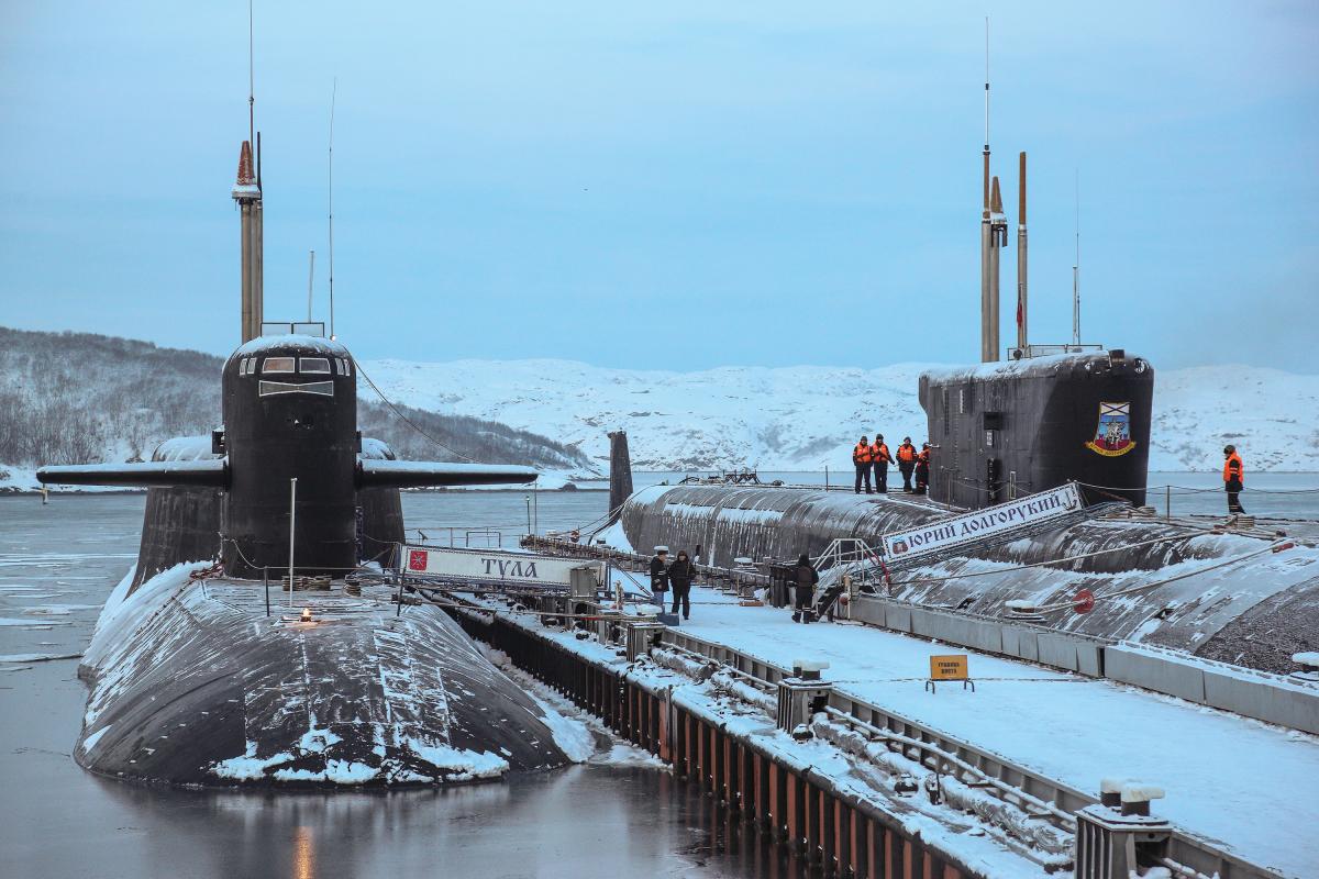 Nuclear-powered ballistic missile submarines K-114 Tula, left, and Yury Dolgorukiy are parked at the Northern Fleet submarine forces headquarter in Gadzhiyevo, Murmansk region, Russia