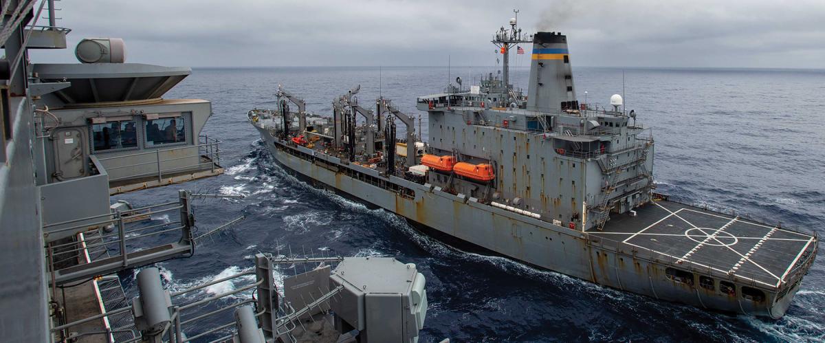 The fleet replenishment oiler USNS John Ericsson (T-AO-194) prepares to transfer fuel to the USS Ronald Reagan (CVN-76) in the Philippine Sea in May.