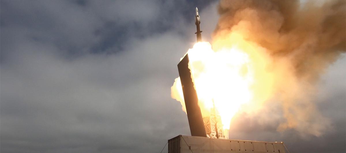 The USS Savannah (LCS-28) fires an SM-6 missile from a containerized launching system as part of a series of experiments integrating government and businesses to deliver new capabilities.