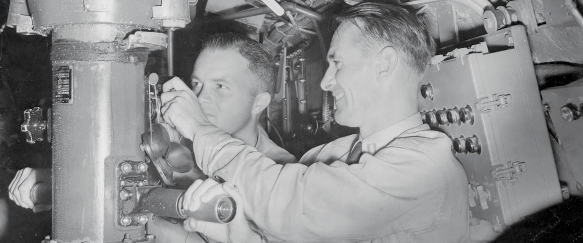 Commander Edward L. Beach (left) on duty on board the USS Amberjack. Beach commanded the Amberjack after a tour in the Navy’s Atomic Defense Section in the Pentagon.