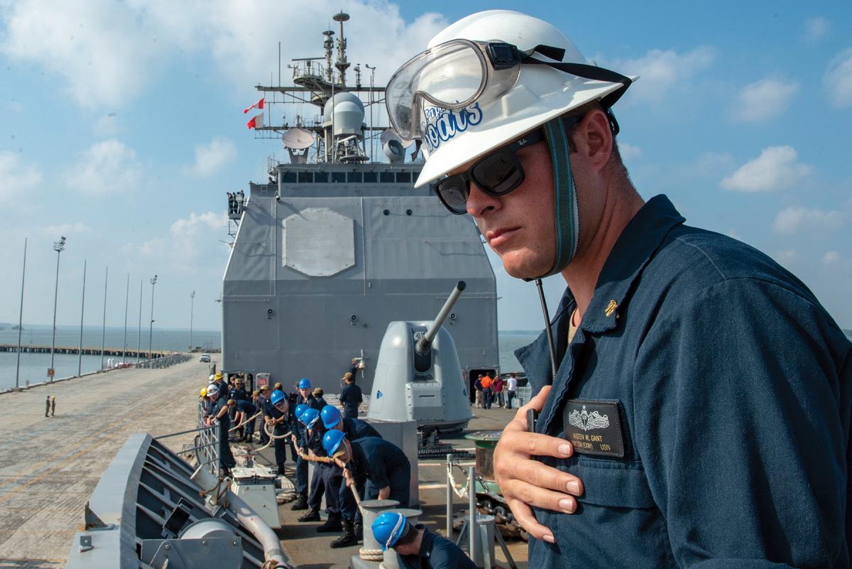 A chief boatswain’s mate observes for safety as sailors handle lines during sea and anchor detail on board the guided-missile cruiser USS Vella Gulf (CG-72). A culture in which sailors choose the safest approach is far more effective than one in which safety is enforced from above.