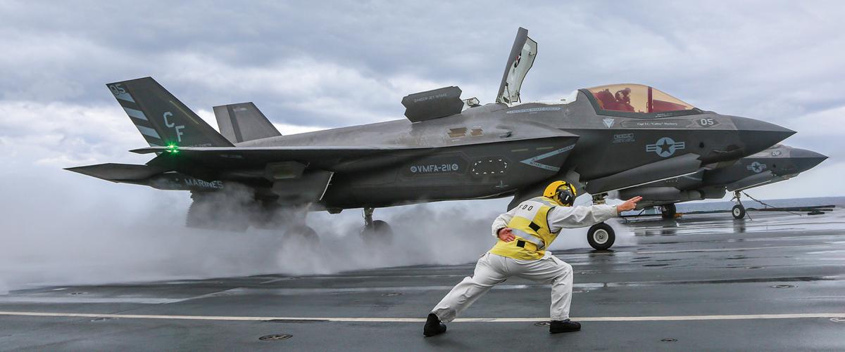 A Marine Fighter Attack Squadron 211 F-35B Lightning II on the flight deck of HMS Queen Elizabeth in the Mediterranean in November 2021. The Lightning II community does not have enough landing signal officers (LSOs) for deployments, nor is there a clear way to solve this issue without making manpower sacrifices or funding a Marine Corps F-35B LSO school.